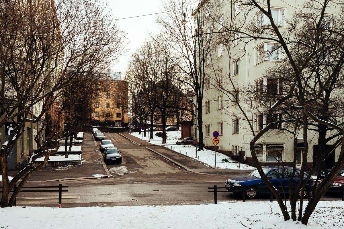 Street with snow and cars