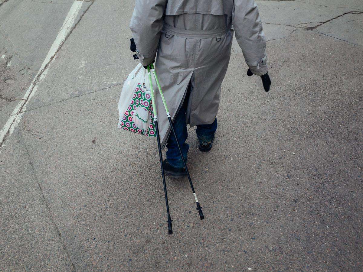 Elder walking down the street