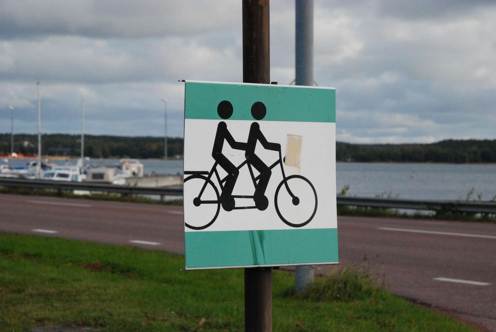 Sign with cyklists
