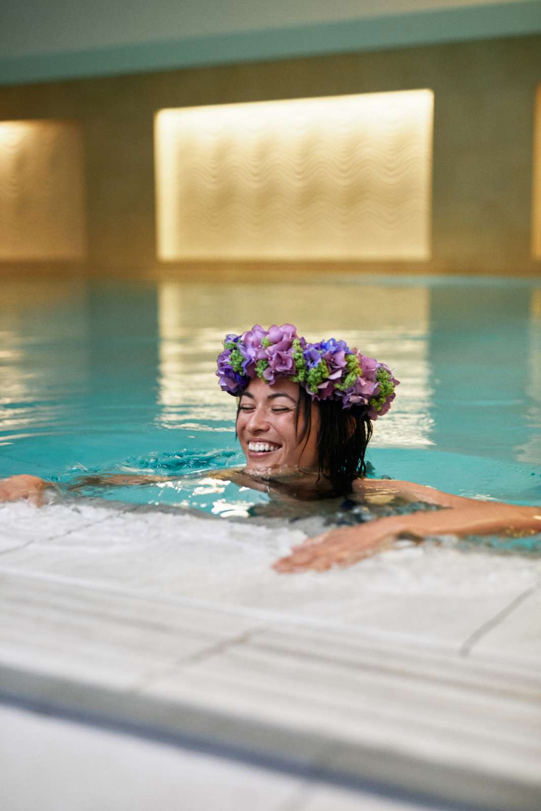 37 model in pool with flower head band .jpg