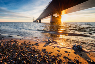 Photo of the Danish Great Belt Bridge at sunset