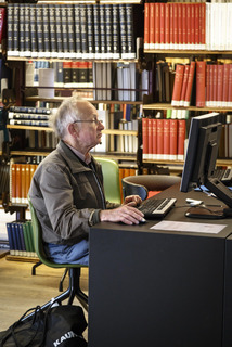 Elderly man using a computer