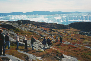 People by ice fjord