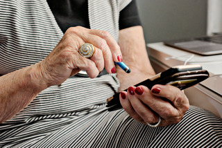 Elderly woman using smartphone