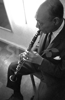 Edmond Hall. Playing clarinet backstage at Odd Fellow Mansion, Copenhagen, 1961