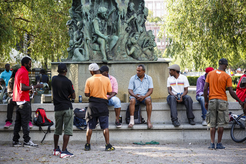 Africans by statue in Stockholm