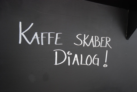 Sign: 'Coffee creates dialog'
