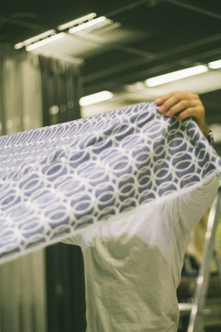 Man working with fabric