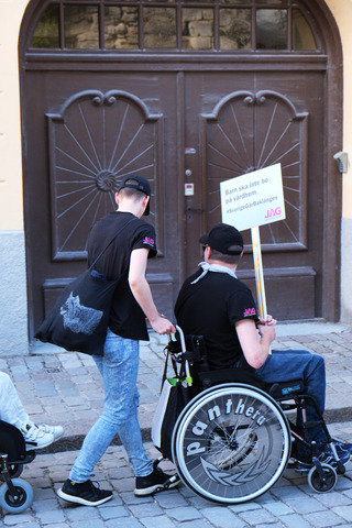 Man in wheelchair protesting