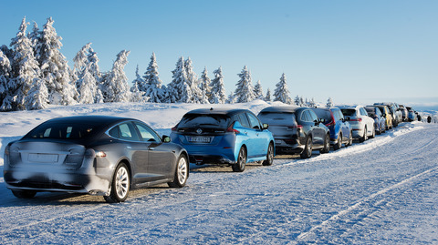 Winter lanscape and car lineup