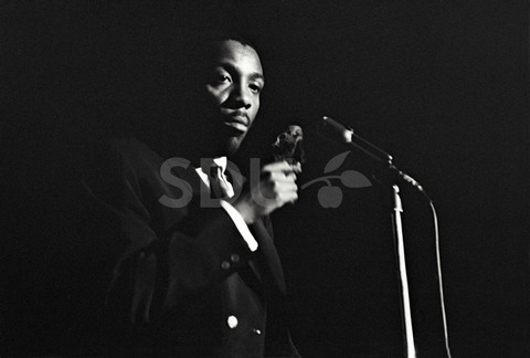 Dick Gregory. Performing at Carnegie Hall, New York, 1962