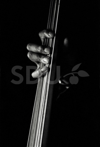 Gene Ramey. Practicing on his contrabass in a studio, New York, 1963