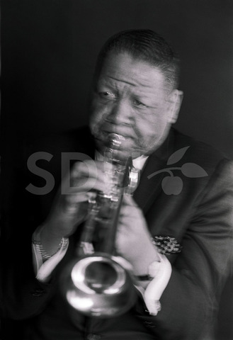 Henry Red Allen. Practicing on trumpet in a studio, New York, 1964.