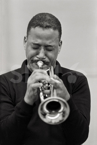 Ray Nance. Practicing on his trumpet in a studio, New York, 1964
