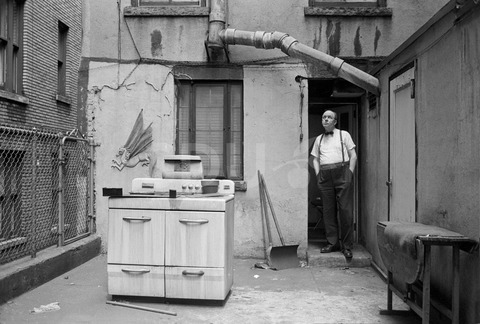 Timme Rosenkrantz. Stands in the backyard of his home, New York, 1962