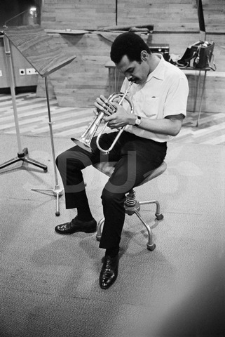 Art Farmer. Practicing on his trumpet in the Radio House, Copenhagen, 1965