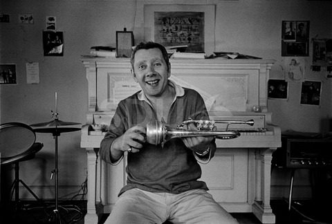 Ruby Braff. Practicing on his trumpet at his home, New York, 1969
