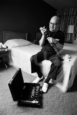 Barney Bigard. In a hotel room with his clarinet, New York, 1975