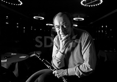 Woody Herman. Practicing on his clarinet in a studio, New York, 1975