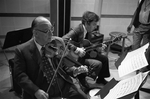 Joe Venuti, and Bucky Pizzarelli. Practicing in a studio, New York, 1975