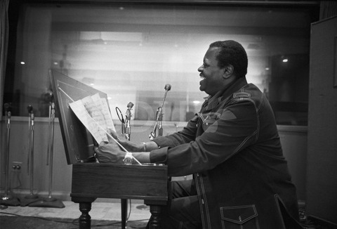 Oscar Peterson. Looking through his notes in a recording studio, Los Angeles, 1976