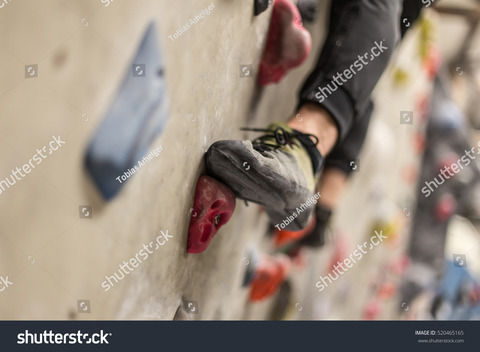 stock photo climbing shoes in boulder climbing hall 520465165