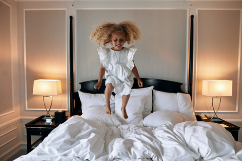 girl jumping on bed 2 