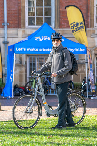 Making cycling e-asier beneficiary Zafar Saleem next to his free one month e-cycle loan from Leicester Bike Park community hub. Taken Monday, 20 Feb 2023