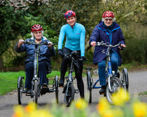 Dame Sarah Storey (middle) and participants sit on e-trikes in Debdale Park in Manchester on March 21 2023. Public event took place to mark the launch of Cycling UK's new e-cycle scheme, Making cycling e-asier, at Wheels for All.